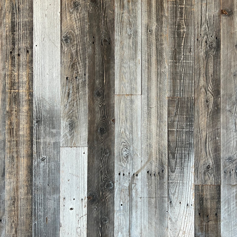 A mix or reclaimed softwoods, combination of greys, and blacks and browns